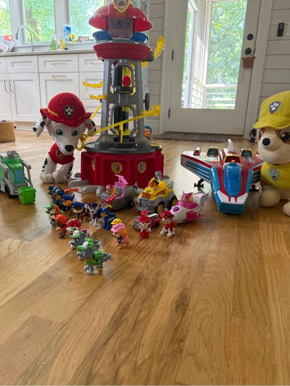 Paw Patrol Adventure Tower Playset with Red Yellow Blue and Green Vehicles